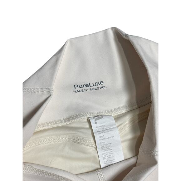 Fabletics PureLuxe XS High-Waisted 7/8 Leggings
Cream Pocket Soft - Picture 3 of 5